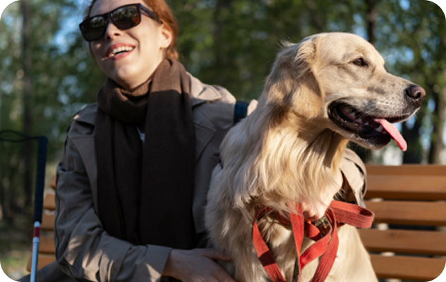 Dog with a visually impaired person